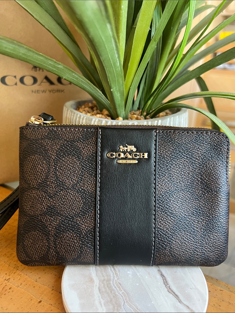 COACH Brown and Black Signature Wristlet with Gold Hardware